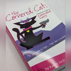 The Cornered Cat: A Woman's Guide to Concealed Carry - Pink and Purple